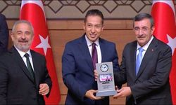 Gazeteci Cem Açıkgöz'e ödül