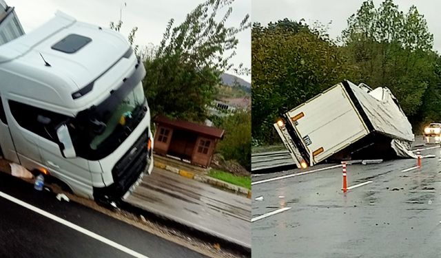 Sağanak yağış kazaya neden oldu: Tır yan yattı