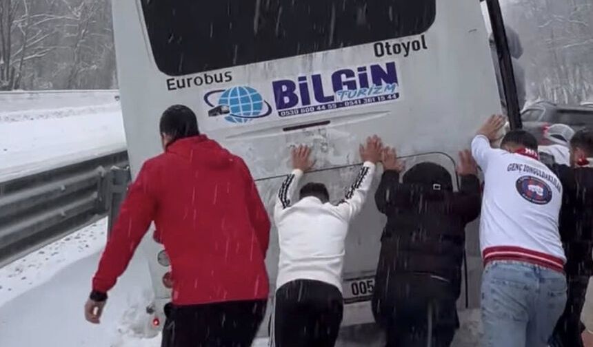 Taraftar otobüsü kanala yan yattı...