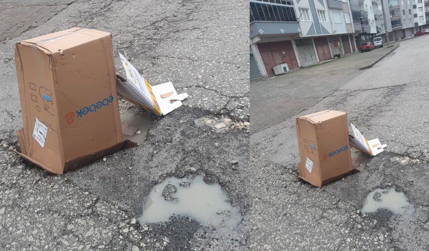 Çukuru karton kutularla kapattılar